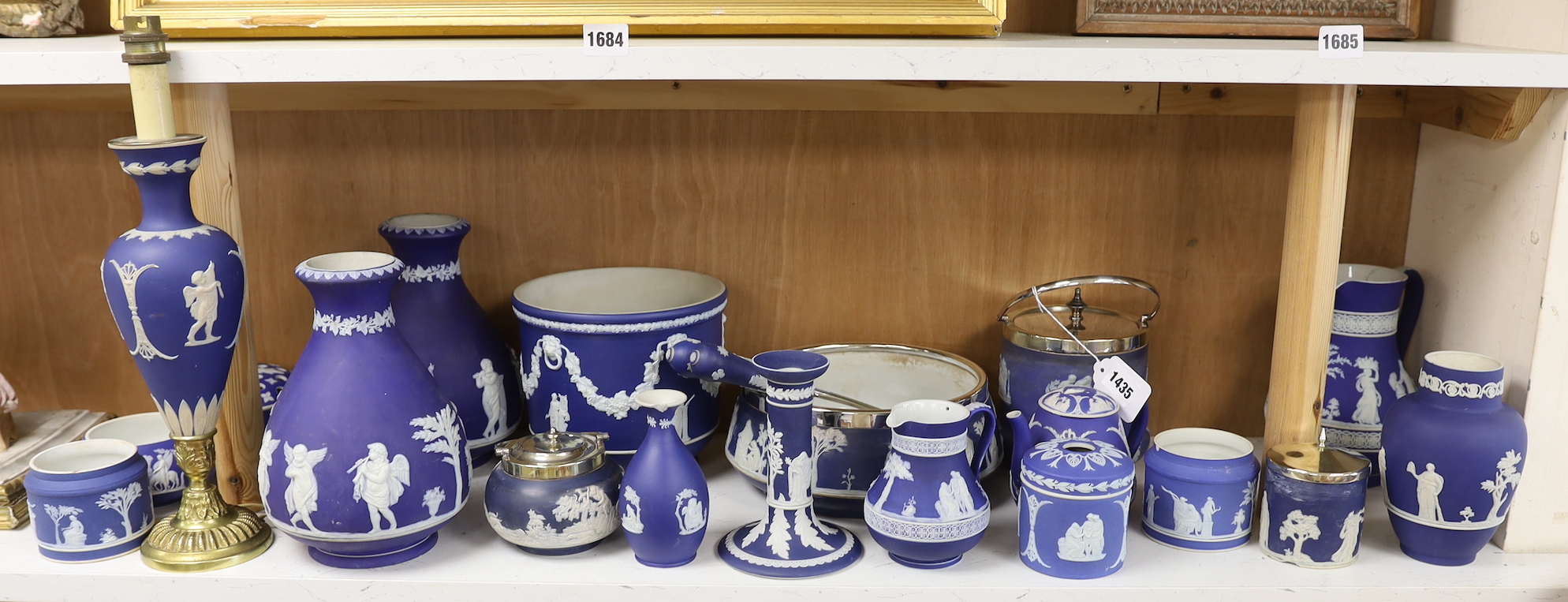 Wedgwood blue Jasper: a pair of vases, salad bowl and servers, jardiniere, biscuit barrel, table lamp, etc. (21 total)